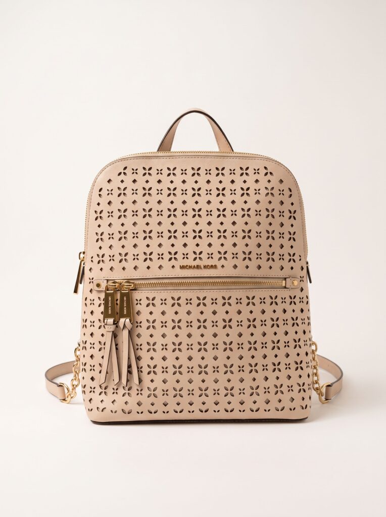 Mochila Michael Kors Bege com Monograma Vazado e Ferragens Douradas